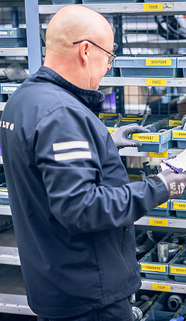 Approved technician selecting a genuine part